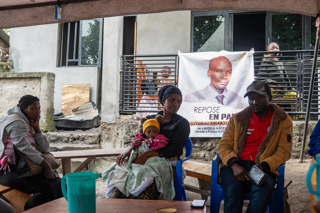 People attend a memorial for Nguvumali Kalabosh Bosco, who died when tunnels collapsed at a major coltan mining site due to landslides, in Goma, eastern Congo, Monday, Feb. 2, 2026. (AP Photo/Moses Sawasawa)