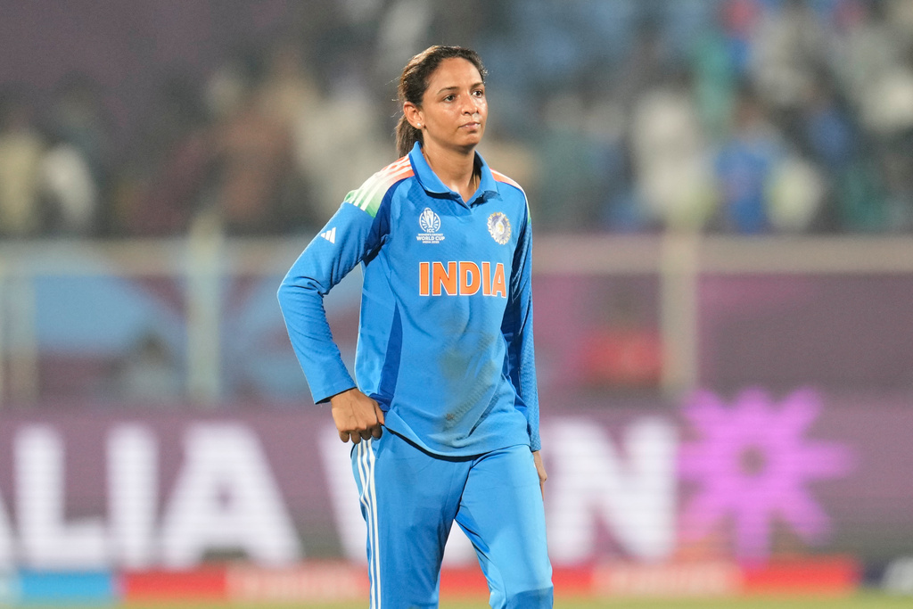 India's captain Harmanpreet Kaur leaves the field after their loss in the ICC Women's Cricket World Cup match against Australia at ACA-VDCA Cricket Stadium in Visakhapatnam, India, Sunday, Oct. 12, 2025. (AP Photo/Aijaz Rahi)