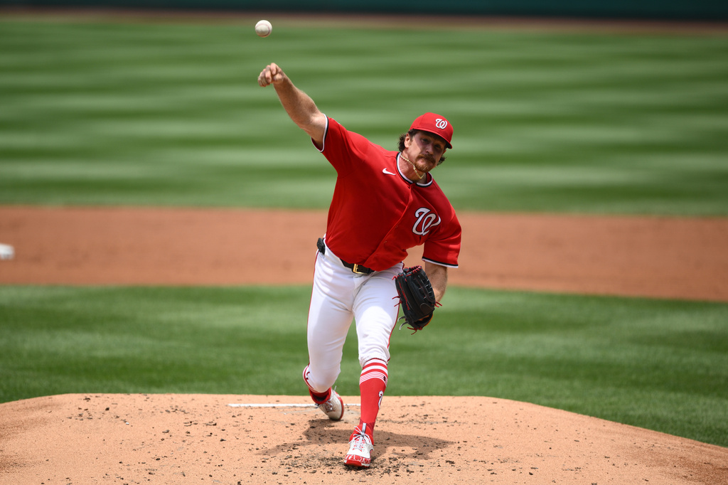 Washington Nationals pitcher Miles Mikolas throws during the second inning of a baseball game against the Seattle Mariners, Sunday, June 14, 2026, in Washington. (AP Photo/Nick Wass)