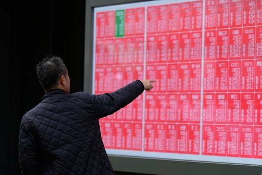 A person loots at an electronic stock board showing Japan's Nikkei index at a securities firm Monday, Oct. 27, 2025, in Tokyo. (AP Photo/Eugene Hoshiko) A person loots at an electronic stock board showing Japan's Nikkei index at a securities firm Monday, Oct. 27, 2025, in Tokyo. (AP Photo/Eugene Hoshiko)