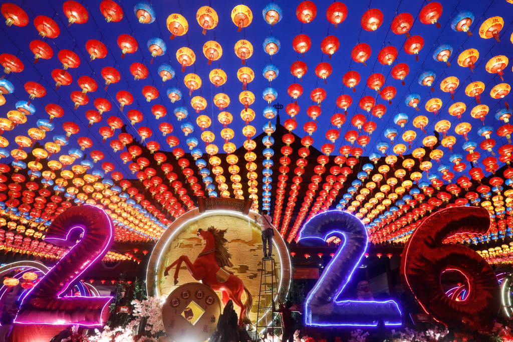 Workers install ornaments during the celebration of the Lunar New Year at a temple in Deli Serdang, North Sumatra, Indonesia, Tuesday, Feb. 17, 2026. (AP Photo/Binsar Bakkara)