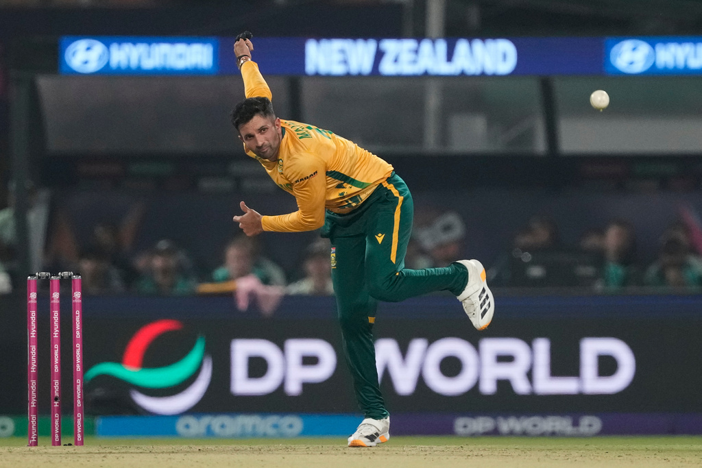 South Africa's Keshav Maharaj bowls a deliveryduring the first T20 World Cup cricket semifinal match between New Zealand and South Africa in Kolkata, India, Wednesday, March 4, 2026. (AP Photo/Anupam Nath)