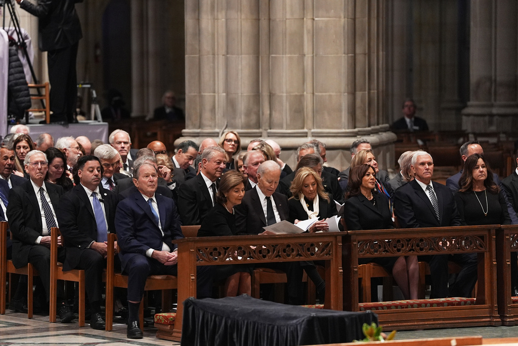 Former Presidents front row from left, George W. Bush with Laura Bush, Joe Biden with Jill Biden and former Vice Presidents Kamala Harris and Mike Pence with Karen Pence, front right, and other invited guests, are seated during the funeral for former Vice President Dick Cheney at the Washington National Cathedral on Thursday, Nov. 20, 2025 in Washington. (AP Photo/Matt Rourke)