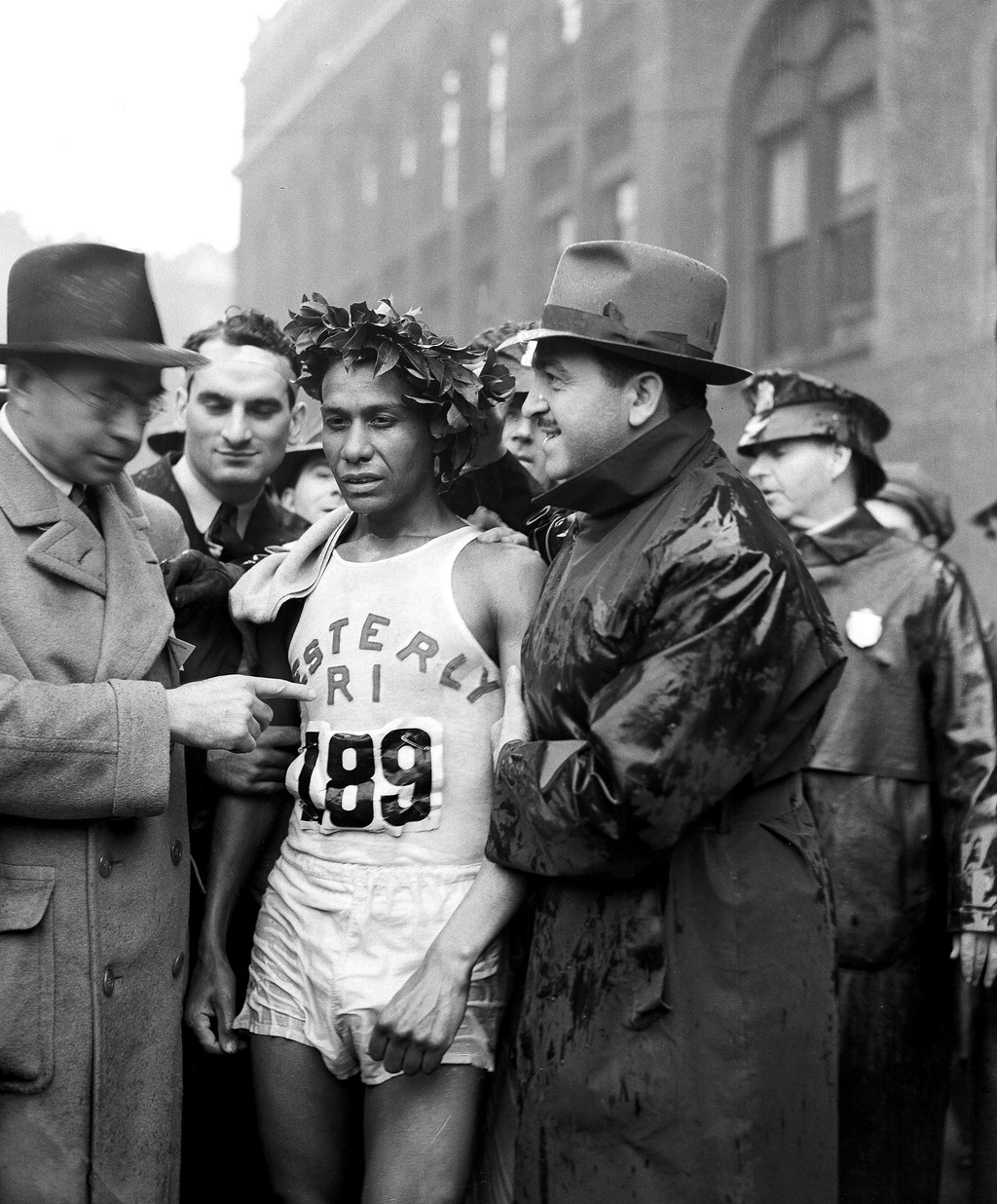 FILE - Ellison M. Brown, winner of the Boston Marathon, is shown in an exhausted state after the race, April 19, 1939. (AP Photo/Abe Fox, File)