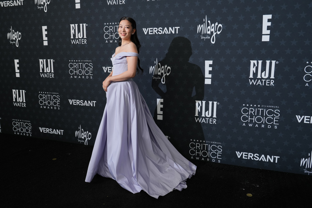Arden Cho arrives at the 31st Annual Critics Choice Awards on Sunday, Jan. 4, 2026, at The Barker Hanger in Santa Monica, Calif. (Photo by Jordan Strauss/Invision/AP)
