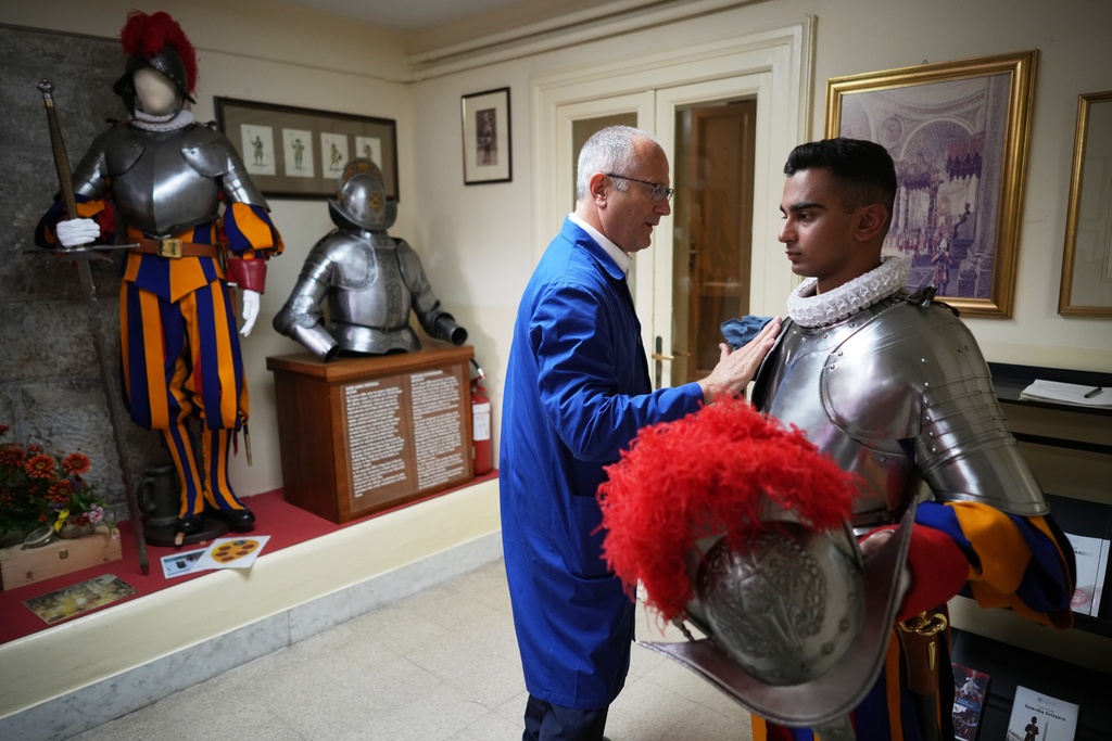 Pontifical Swiss Guards prepare ahead of their swearing in ceremony, at the Vatican, Saturday, Oct. 4, 2025. (AP Photo/Andrew Medichini)