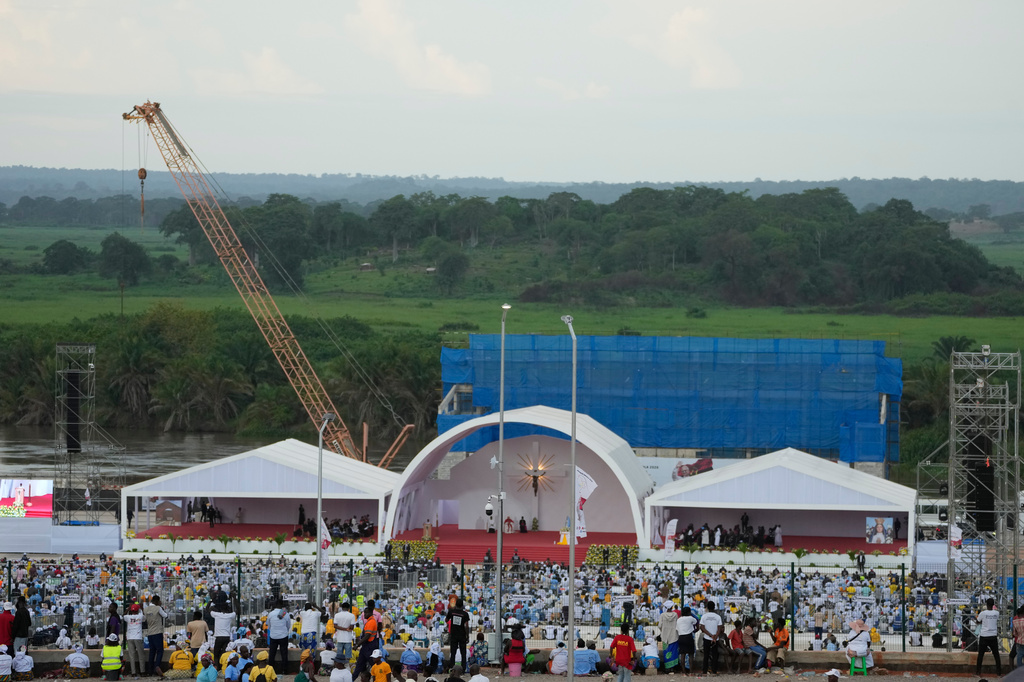 Pope Leo XIV leads the Holy Rosary prayer in front of the Sanctuary of Mama Muxima, in Muxima, Angola, Sunday, April 19, 2026. (AP Photo/Themba Hadebe)