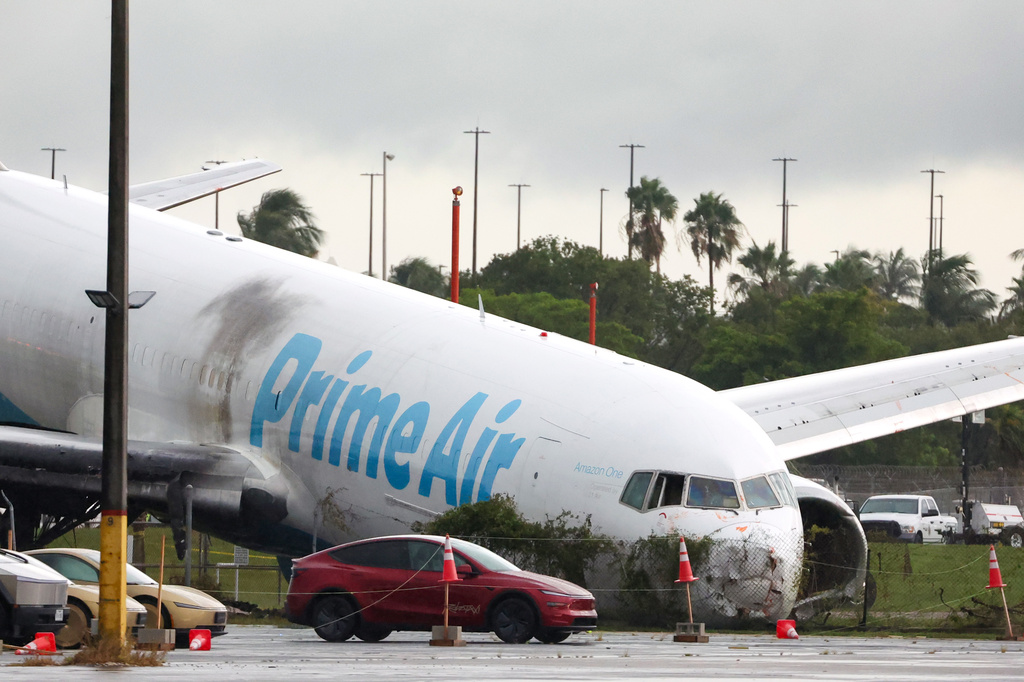An Amazon cargo plane sits at Miami International Airport after overshooting a runway on Monday, Sept. 7, 2026, in Miami. (AP Photo/David Santiago)