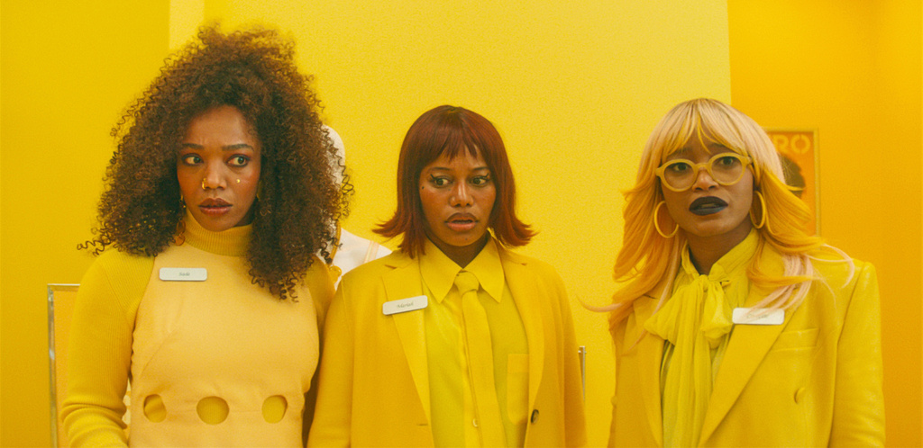 This image released by Neon shows, from left, Naomi Ackie, Taylour Paige, and Keke Palmer in a scene from "I Love Boosters." (Neon via AP)