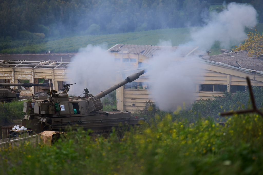 Israeli military mobile artillery unit fires towards southern Lebanon from northern Israel, Thursday, April 9, 2026. (AP Photo/Ariel Schalit)