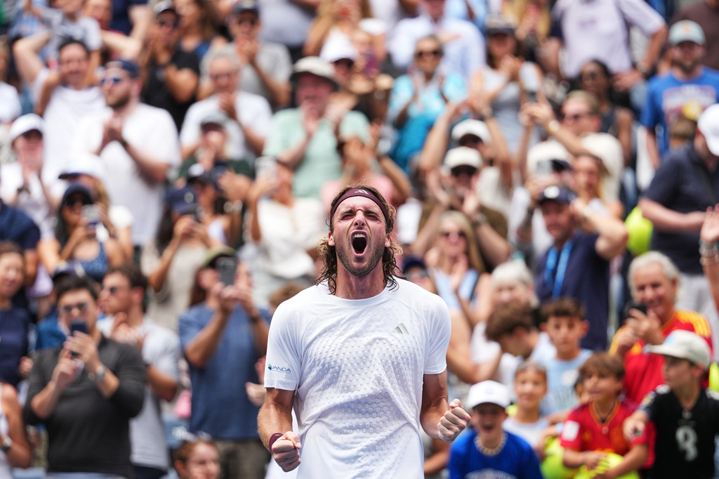 Stefanos Tsitsipas, of Greece, celebrates winning a match against Arthur Fils, of France, during the first round of the U.S. Open tennis championships, Monday, Aug. 31, 2026, in New York. (AP Photo/Kirsty Wigglesworth)