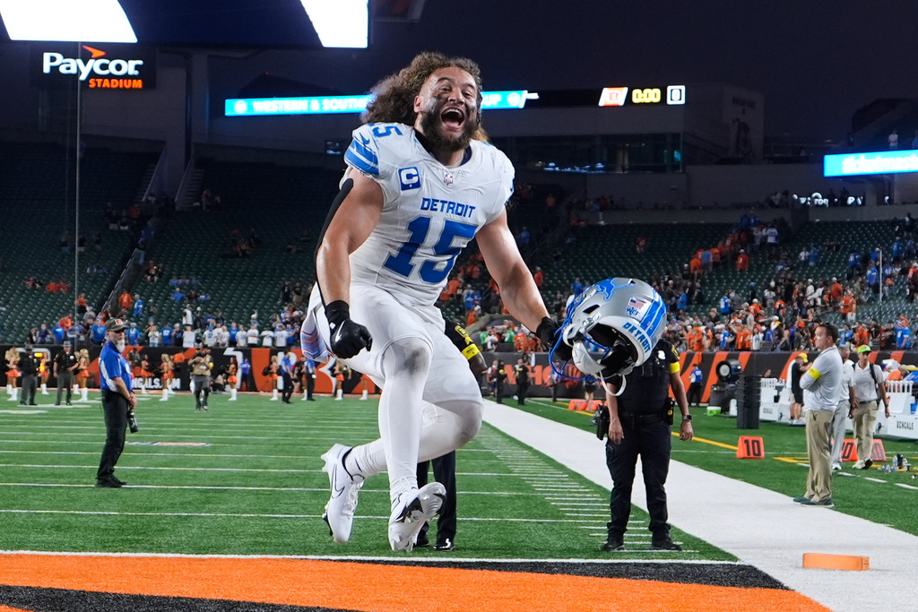 Detroit Lions linebacker Grant Stuard (15) celebrates as he runs off the field after an NFL football game Sunday, Oct. 5, 2025, in Cincinnati. (AP Photo/Carolyn Kaster)