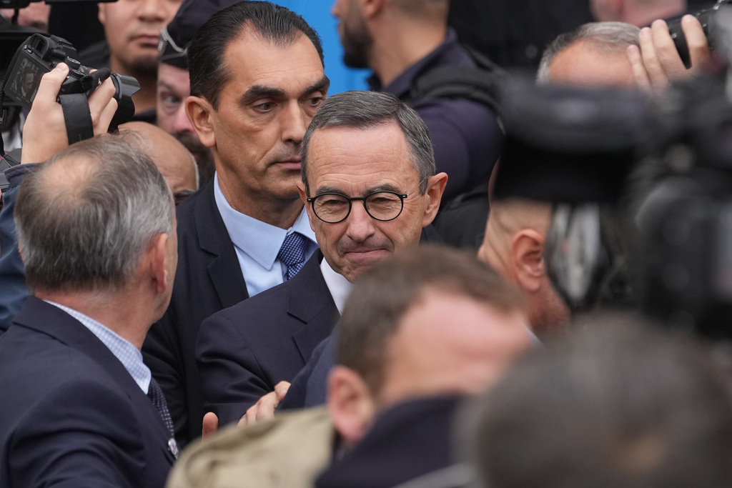 Bruno Retailleau, head of the Conservative Party Les Republicains and outgoing Interior Minister, leaves after a meeting at the party headquarters Monday, Oct. 6, 2025 in Paris after France's prime minister Sebastien Lecornu resigned plunging the country into a deep political crisis. (AP Photo/Thibault Camus)