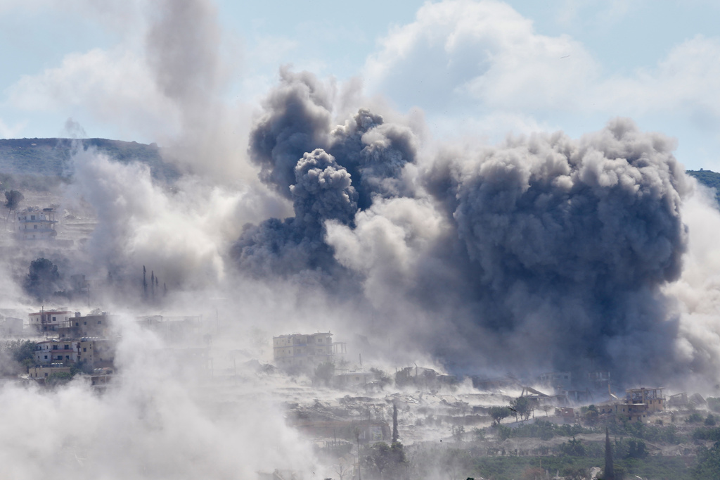 Smoke billow from an Israeli-controlled detonation in the village of Mansouri, as is seen from Hanniyeh village, southern Lebanon, Friday, Sept. 11, 2026. (AP Photo/Hussein Malla)