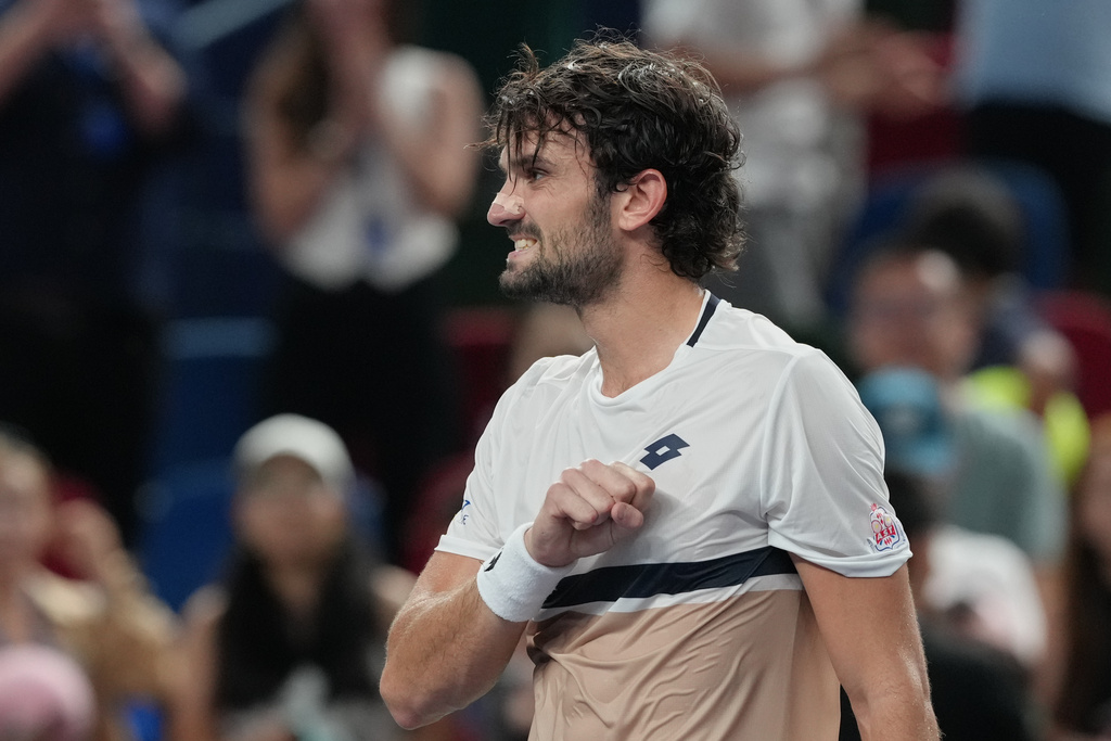 Valentin Vacherot of Monaco celebrates after defeating Holger Rune of Denmark in their men's singles quarterfinals match of the Shanghai Masters tennis tournament at Qizhong Forest Sports City Tennis Center, in Shanghai, China, Thursday, Oct. 9, 2025. (AP Photo/Andy Wong)