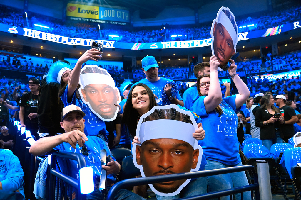Fans cheer before Game 1 in a third-round NBA basketball playoffs series between the San Antonio Spurs and the Oklahoma City Thunder Monday, May 18, 2026, in Oklahoma City. (AP Photo/Tony Gutierrez)