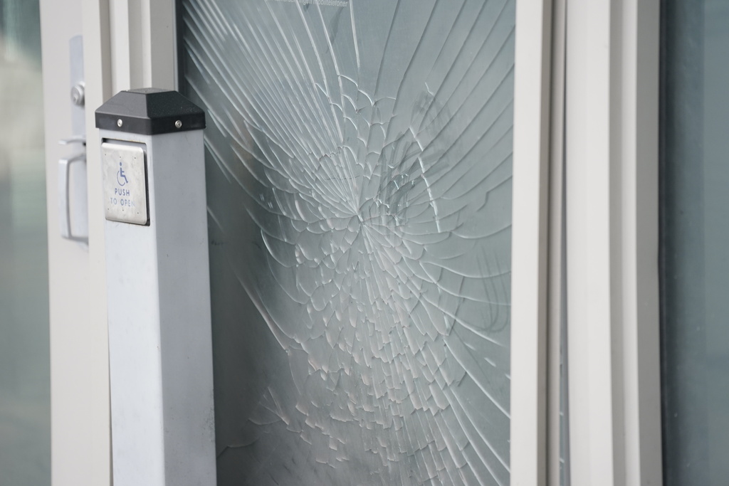 A view of a shattered door, at the U.S. Embassy in Oslo, Sunday, March 8, 2026. (Fredrik Varfjell /NTB Scanpix via AP)
