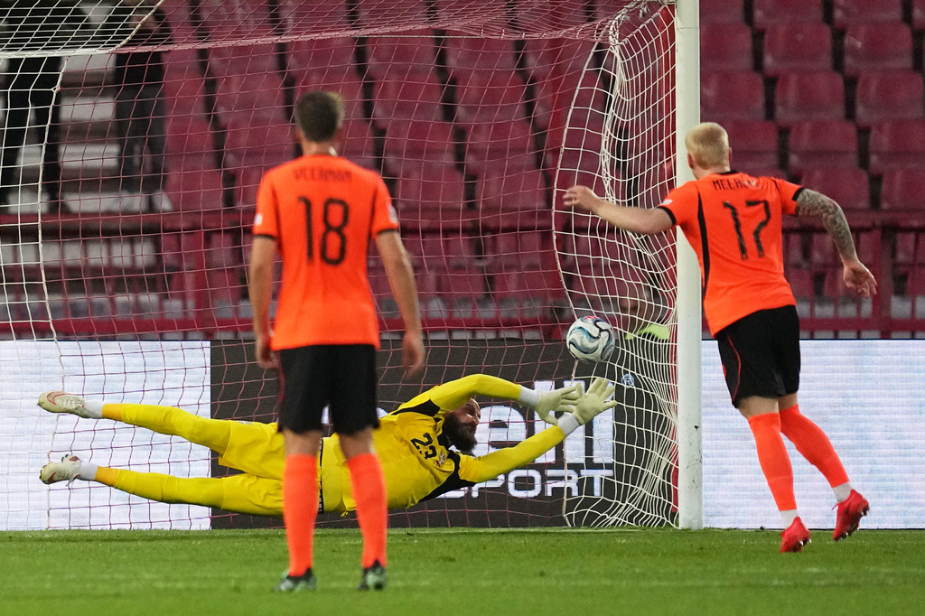 Netherlands' Mexx Meerdink scores the opening goal from the penalty spot past Serbia goalkeeper Vanja Milinkovic-Savic during the Nations League soccer match between Serbia and the Netherlands in Belgrade, Serbia, Sunday, Sept. 27, 2026. (AP Photo/Darko Vojinovic)