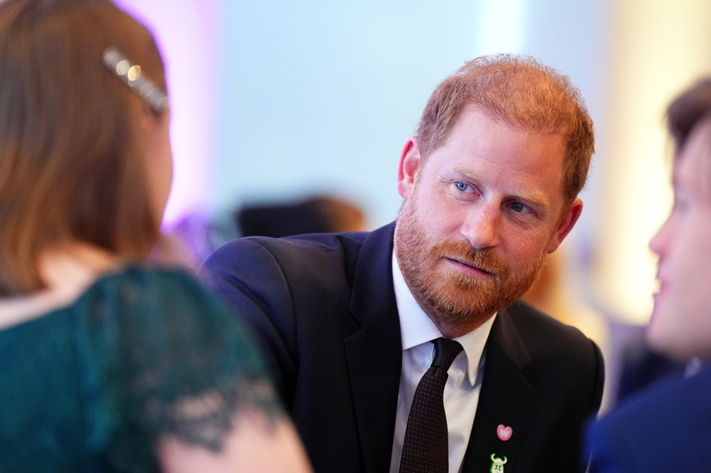 Britain's Prince Harry meets the winner of the Inspirational Young Person 15-18, Rosanna Cornforth-Revill, during the WellChild Awards 2026 in London, Monday, Sept. 21, 2026. (Aaron Chown/Pool Photo via AP)
