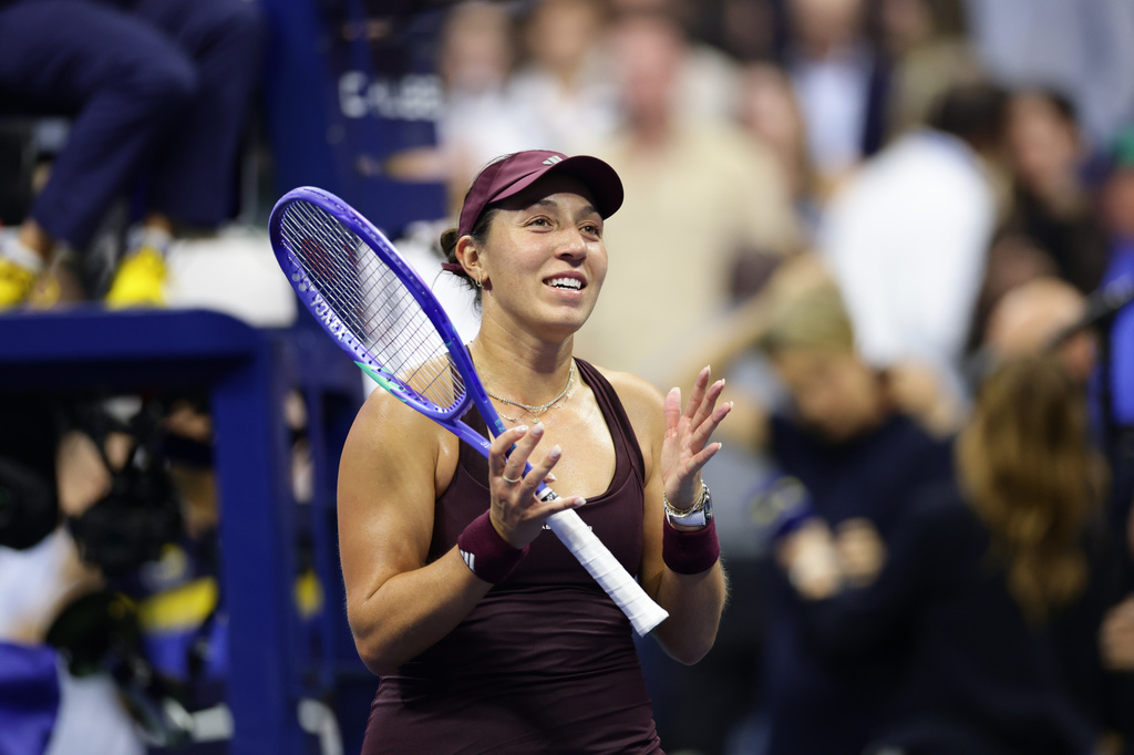 Jessica Pegula, of the United States, acknowledges the fans after defeating Emma Navarro, of the United States, in three sets during the quarterfinal round of the U.S. Open tennis championships, Tuesday, Sept. 8, 2026, in New York. (AP Photo/Adam Hunger)