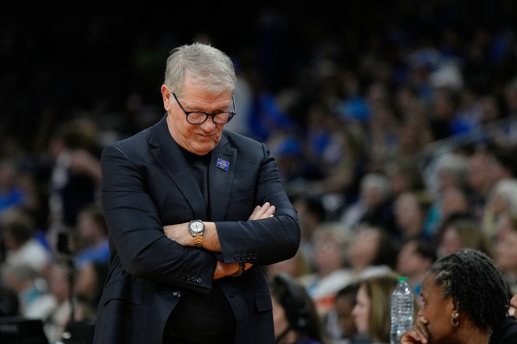 UConn head coach Geno Auriemma reacts during the second half of a woman's NCAA college basketball tournament semifinal game between UConn and South Carolina at the Final Four, Friday, April 3, 2026, in Phoenix. (AP Photo/Ross D. Franklin)