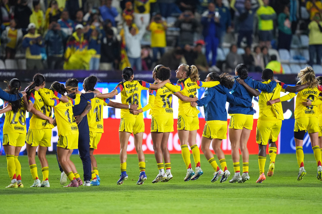 Players of Mexico's America celebrate after winning the Women's CONCACAF Champions Cup final soccer match against The United States' Washington Spirit in Pachuca, Mexico, Saturday, May 23, 2026.(AP Photo/Fernando Llano)