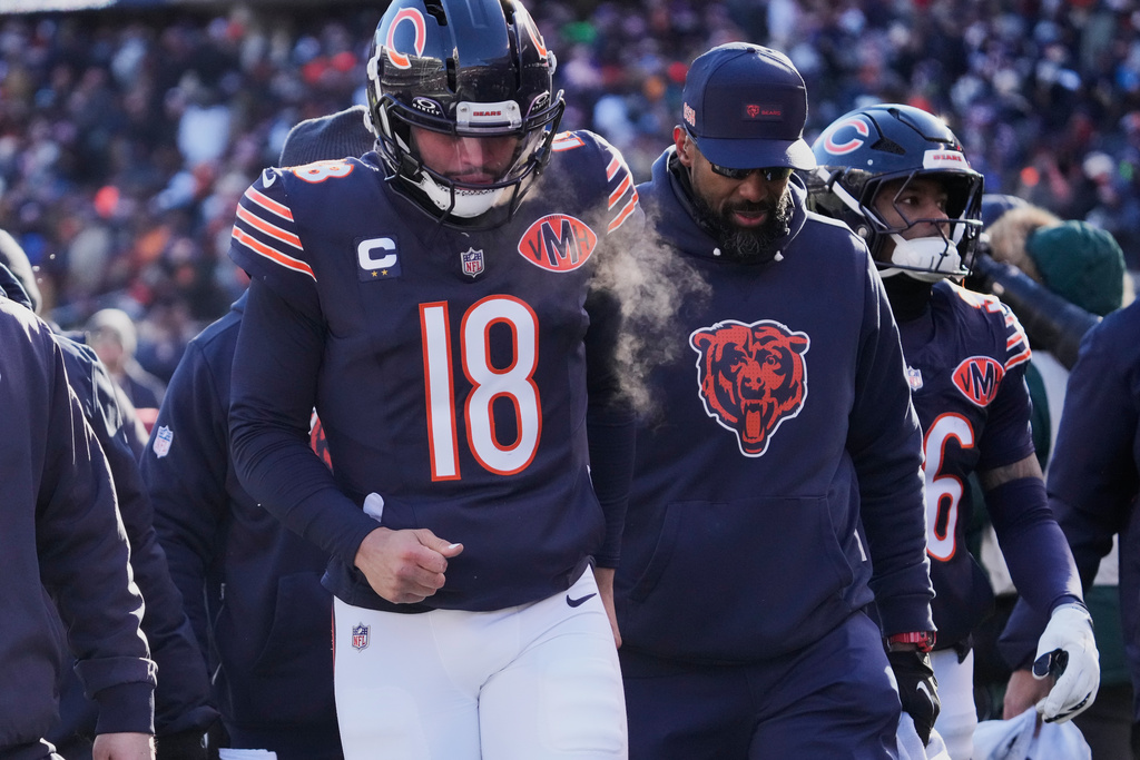 Chicago Bears quarterback Caleb Williams walks off the field at halftime of an NFL football game against the Cleveland Browns in Chicago, Sunday, Dec. 14, 2025. (AP Photo/Nam Y. Huh)