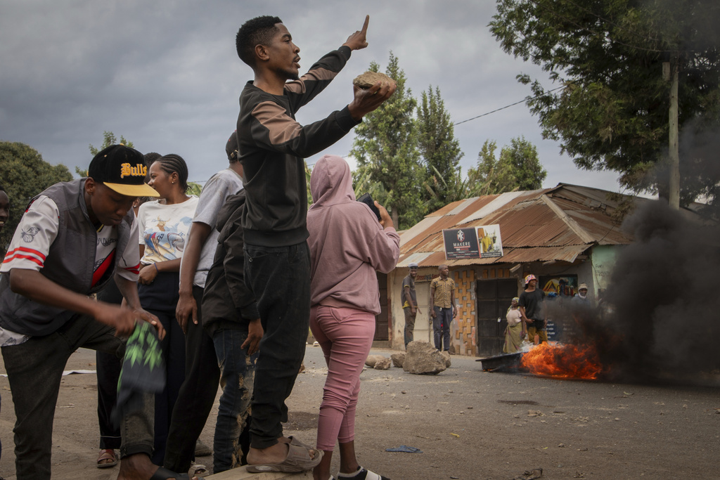 People protest in the streets of Arusha, Tanzania, on election day Wednesday, Oct. 29, 2025. (AP Photo/str)
