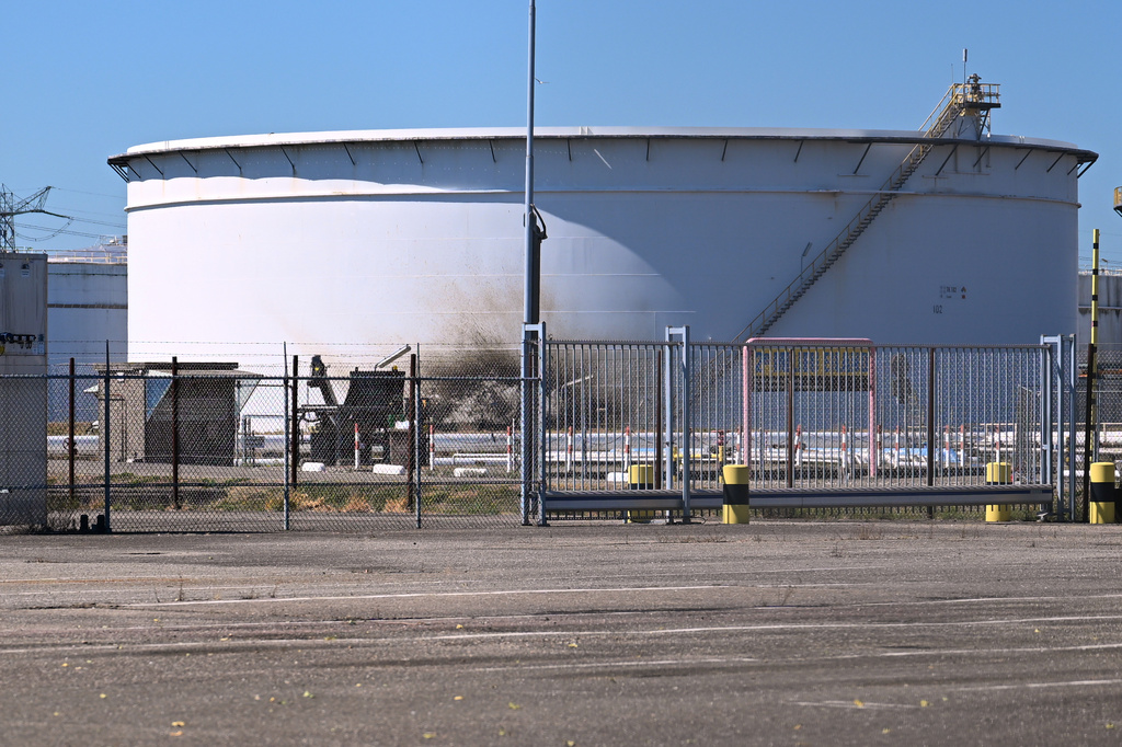 A structure in a refinery and fuel terminal run by Gunvor Energy carries the traces of an explosion at the Dutch port of Rotterdam which killed at least one person and injured several others according to police, in Rotterdam, Netherlands, Thursday, Aug. 13, 2026. (AP Photo/Mouneb Taim)