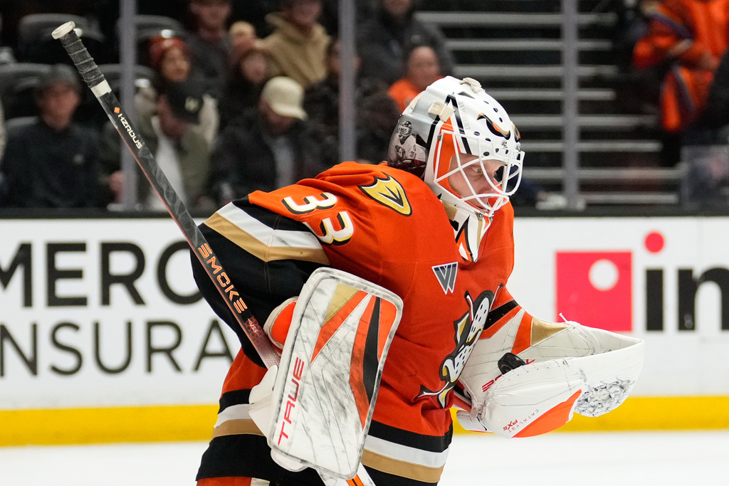 Anaheim Ducks goaltender Ville Husso makes a glove save during the second period of an NHL hockey game against the Utah Mammoth, Wednesday, Dec. 3, 2025, in Anaheim, Calif. (AP Photo/Mark J. Terrill)
