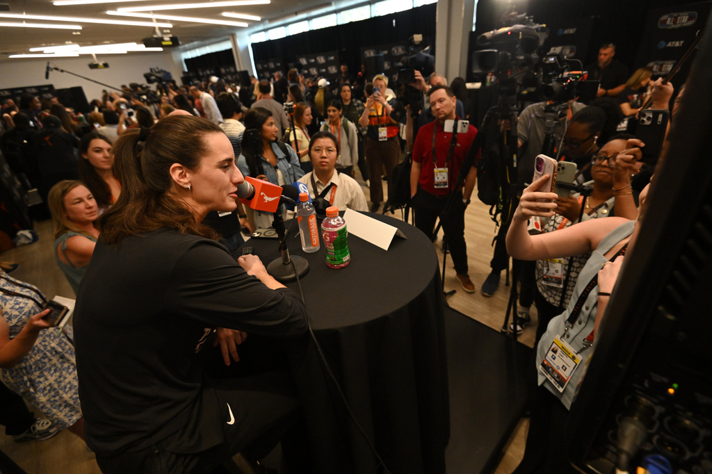 WNBA All Star Caitlin Clark speaks to the media during practice at the Obama Presidential Center in Chicago, Friday, July 24, 2026. (AP Photo/Paul Beaty)