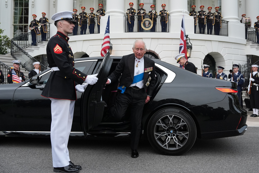 Britain's King Charles III and Queen Camilla arrive at the South Portico of the White House for a State Dinner with President Donald Trump and first lady Melania Trump Tuesday, April 28, 2026, in Washington. (AP Photo/Alex Brandon)