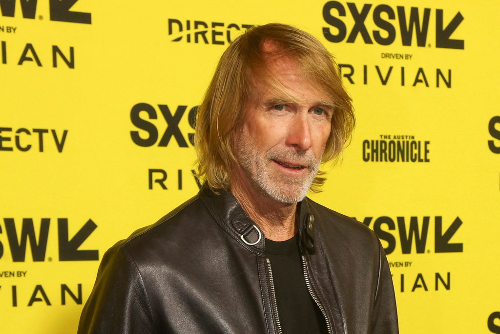 FILE - Michael Bay arrives for the world premiere of "Drop" at the Paramount Theatre during the South by Southwest Conference and Festival March 9, 2025, in Austin, Texas. (Photo by Jack Plunkett/Invision/AP, File)