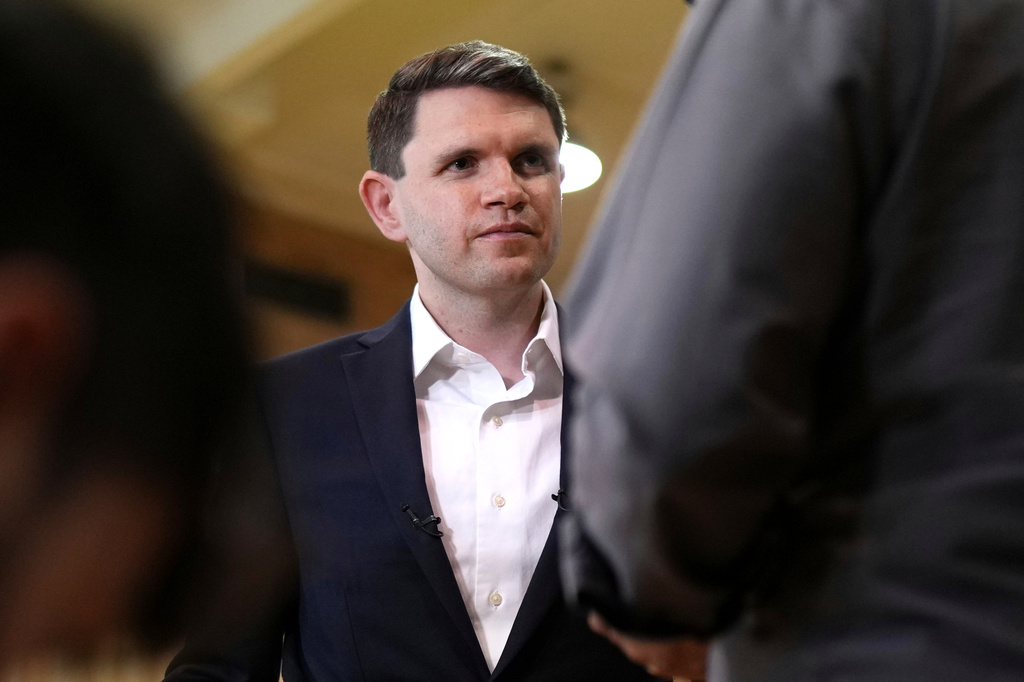 FILE - Democratic U.S. Senate candidate Texas state Rep. James Talarico speaks during a television interview at a food drive at the Frederick Douglass Human Services and Justice Center, Sept. 9, 2026, in Dallas. (AP Photo/Julia Demaree Nikhinson, File)