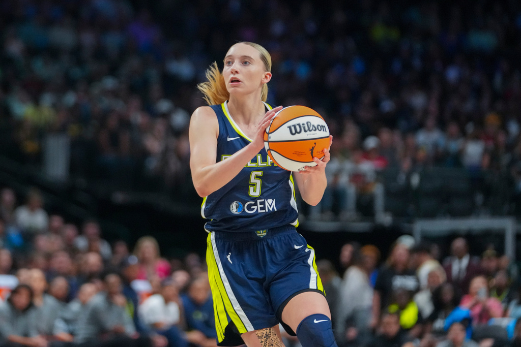 FILE - Dallas Wings guard Paige Bueckers works the floor against the Indiana Fever during the second half of a WNBA basketball game Aug. 1, 2025, in Dallas. (AP Photo/Julio Cortez, File)
