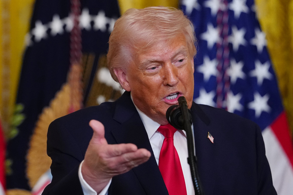 President Donald Trump speaks at a women's history month event in the East Room at the White House, Thursday, March 12, 2026, in Washington. (AP Photo/Julia Demaree Nikhinson)