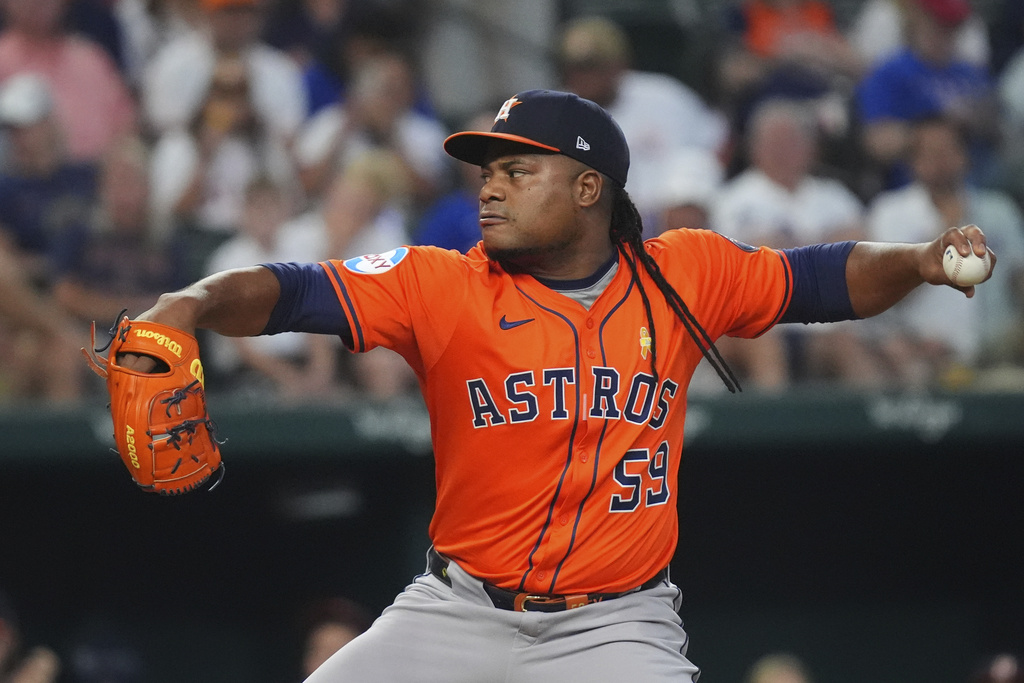 Houston Astros starting pitcher Framber Valdez throws during the first inning of a baseball game against the Texas Rangers, Sunday, Sept. 7, 2025, in Arlington, Texas. (AP Photo/LM Otero)