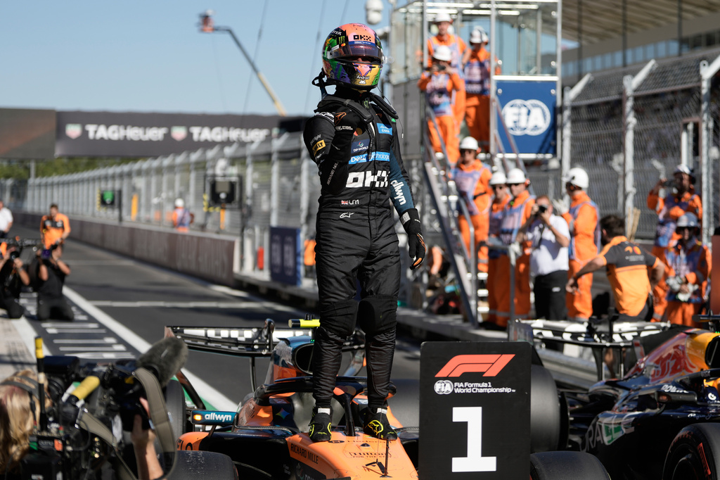 McLaren driver Lando Norris of Britain celebrates his pole position after the qualifying session for the Spanish Formula One Grand Prix in Madrid, Saturday, Sept. 12, 2026. (AP Photo/Bernat Armangue)