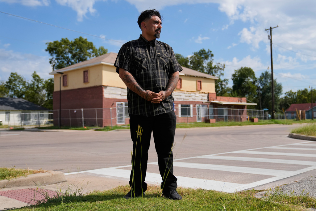Julio Torres poses for a photo Monday, Sept. 22, 2025, in Terrell, Texas, near Serenity Corner, a church he founded nearly a decade ago. (AP Photo/Tony Gutierrez)