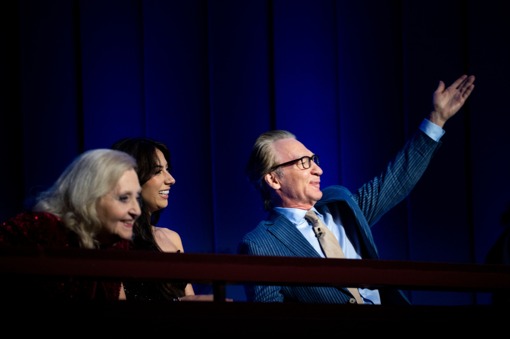 Comedian and political satirist Bill Maher waves to the stage during the 27th Annual Mark Twain Prize for American Humor Celebrating Bill Maher, Sunday, June 29, 2026, in Washington. (AP Photo/Kevin Wolf)