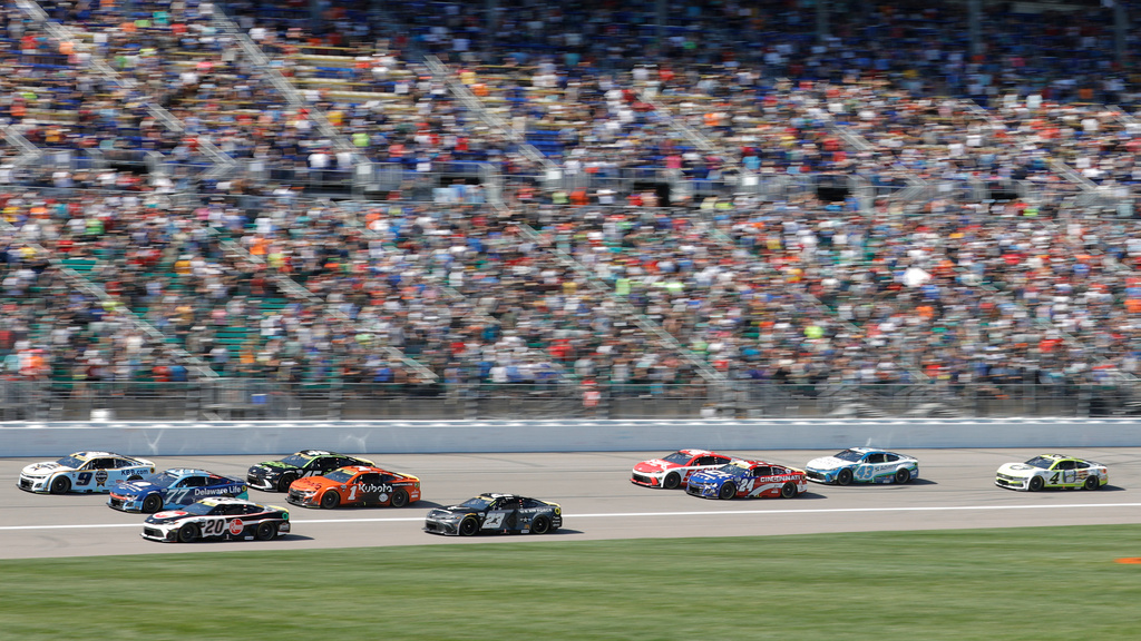 Drivers head down the front straightaway during a NASCAR Cup Series auto race at Kansas Speedway in Kansas City, Kan., Sunday, Sept. 28, 2025. (AP Photo/Colin E. Braley)