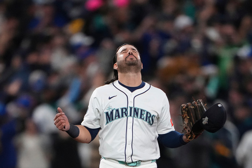 Seattle Mariners' Eugenio Suárez reacts after Game 5 of baseball's American League Championship Series against the Toronto Blue Jays, Friday, Oct. 17, 2025, in Seattle. (AP Photo/Lindsey Wasson) Seattle Mariners' Eugenio Suárez reacts after Game 5 of baseball's American League Championship Series against the Toronto Blue Jays, Friday, Oct. 17, 2025, in Seattle. (AP Photo/Lindsey Wasson)