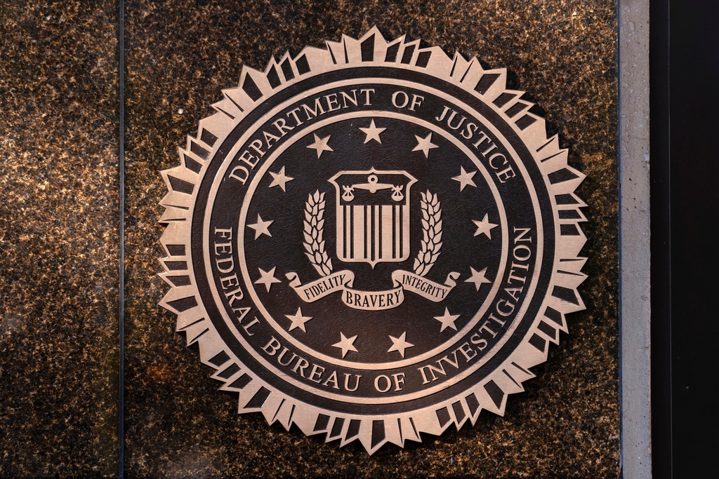 FILE - The seal of the Federal Bureau of Investigation is displayed at its headquarters in Washington, Nov. 18, 2024. (AP Photo/Jose Luis Magana, File)