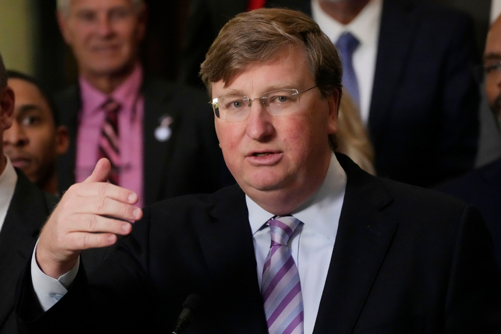 FILE - Mississippi Republican Gov. Tate Reeves responds to a reporter's question, Jan. 25, 2024, at the state Capitol in Jackson, Miss. (AP Photo/Rogelio V. Solis, File)