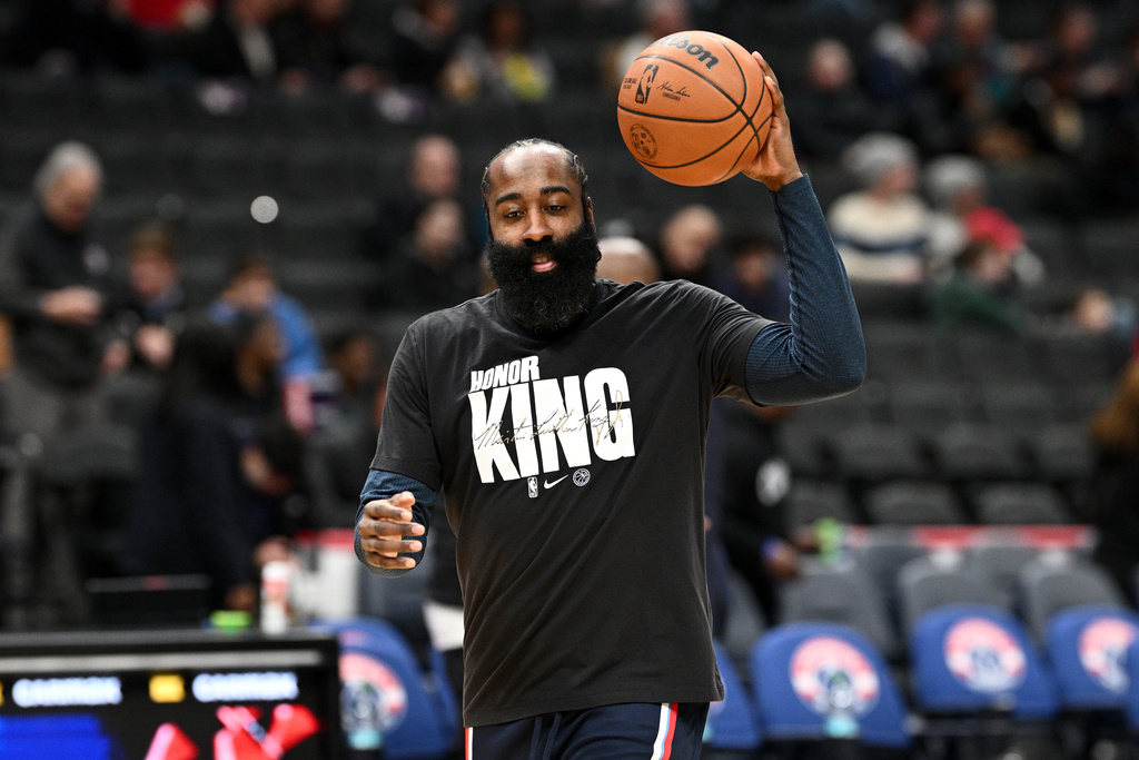 Los Angeles Clippers guard James Harden warms up while wearing a shirt paying tribute to Martin Luther King Jr. before of an NBA basketball game against the Washington Wizards, Monday, Jan. 19, 2026, in Washington. (AP Photo/Nick Wass)