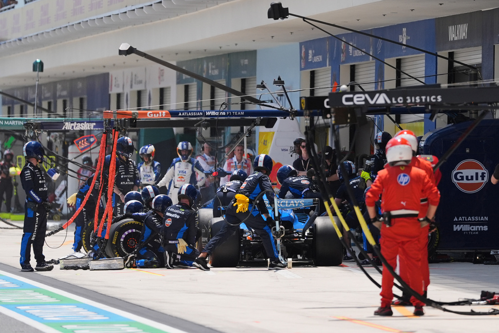 Williams driver Alexander Albon of Thailand makes a pit stop during a sprint auto race at the Miami Formula One Grand Prix, Saturday, May 2, 2026, in Miami Gardens, Fla. (AP Photo/Rebecca Blackwell, Pool)