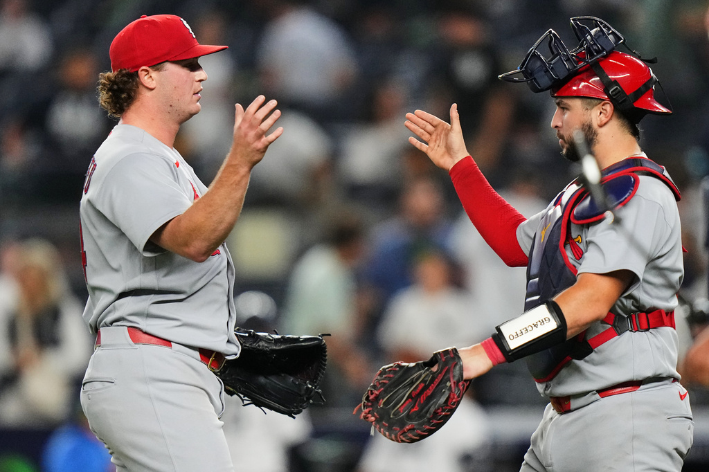 St. Louis Cardinals pitcher Gordon Graceffo, left, celebrates with catcher Jimmy Crooks after a baseball game against the New York Yankees Monday, Aug. 3, 2026, in New York. (AP Photo/Frank Franklin II)