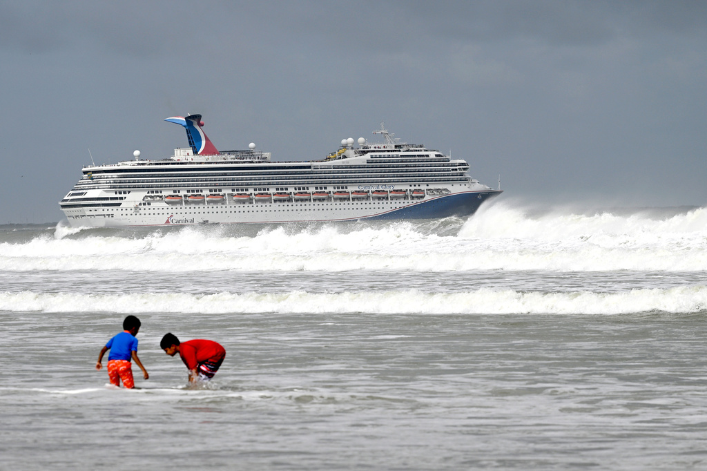 The Carnival Glory cruise ship sets sail as Tropical Storm Imelda passes offshore, Monday, Sept. 29, 2025, in Port Canaveral, Fla. (AP Photo/Phelan M. Ebenhack)