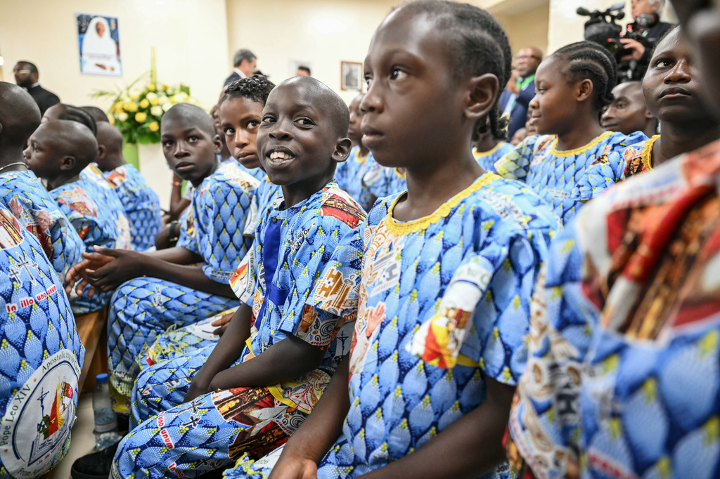 A child smiles as Pope Leo XIV, not pictured, visits the Ngul Zamba (Power of God) orphanagein Yaounde, Cameroon, Wednesday April 15, 2026 on the third day of his apostolic journey to Africa. (Alberto Pizzoli, Pool Photo via AP)