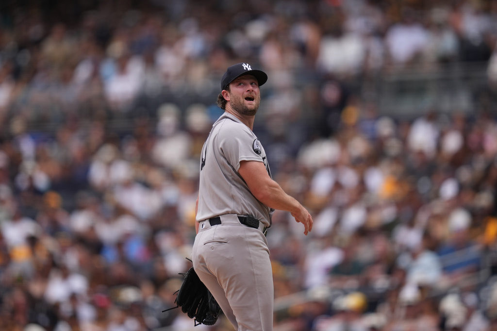New York Yankees starting pitcher Gerrit Cole watches a home run hit by San Diego Padres' Jake Cronenworth during the first inning of a baseball game Sunday, Sept. 6, 2026, in San Diego. (AP Photo/Gregory Bull)